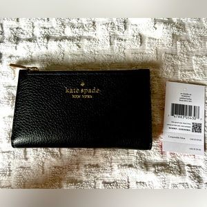 Kate Spade small slim bifold wallet.